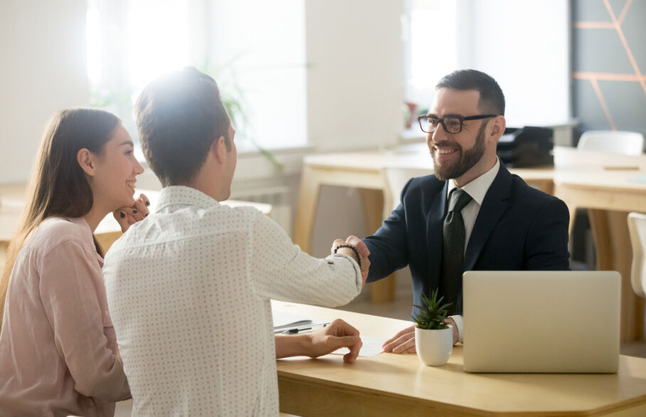 Three people having a meeting