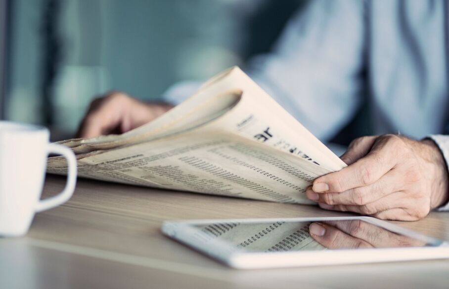 Someone reading a newspaper