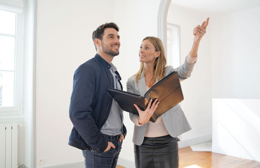 Two people viewing a house