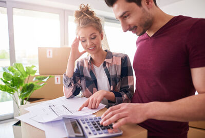 Couple looking at bills