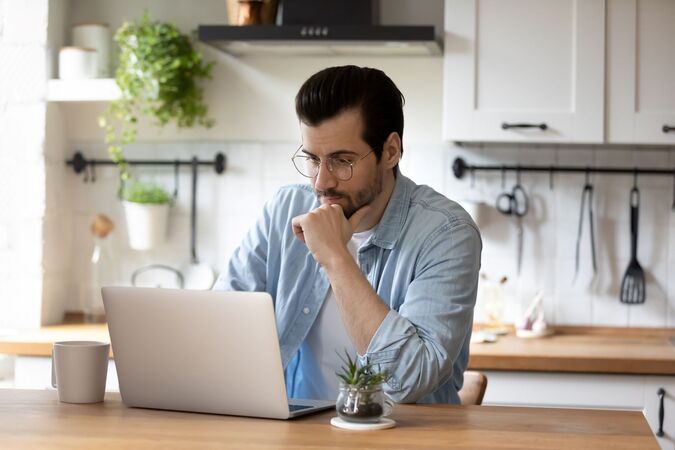 man working on his laptop