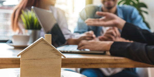Couple in a meeting with advisor
