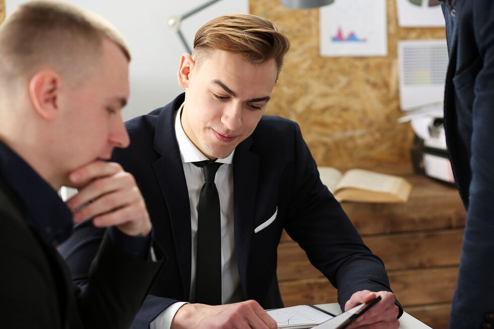Two colleagues in a work meeting