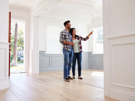 A couple looking around a house